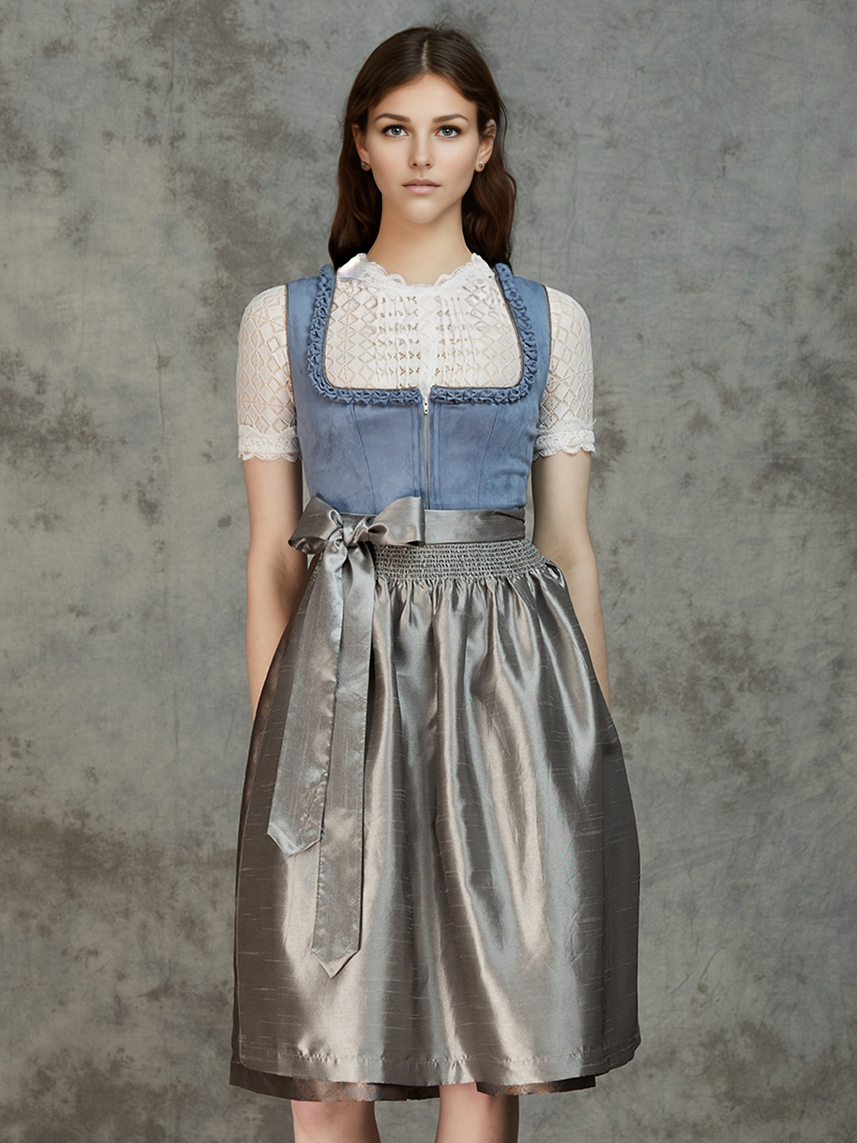 Ein elegantes blaues Dirndl mit traditioneller Schürze